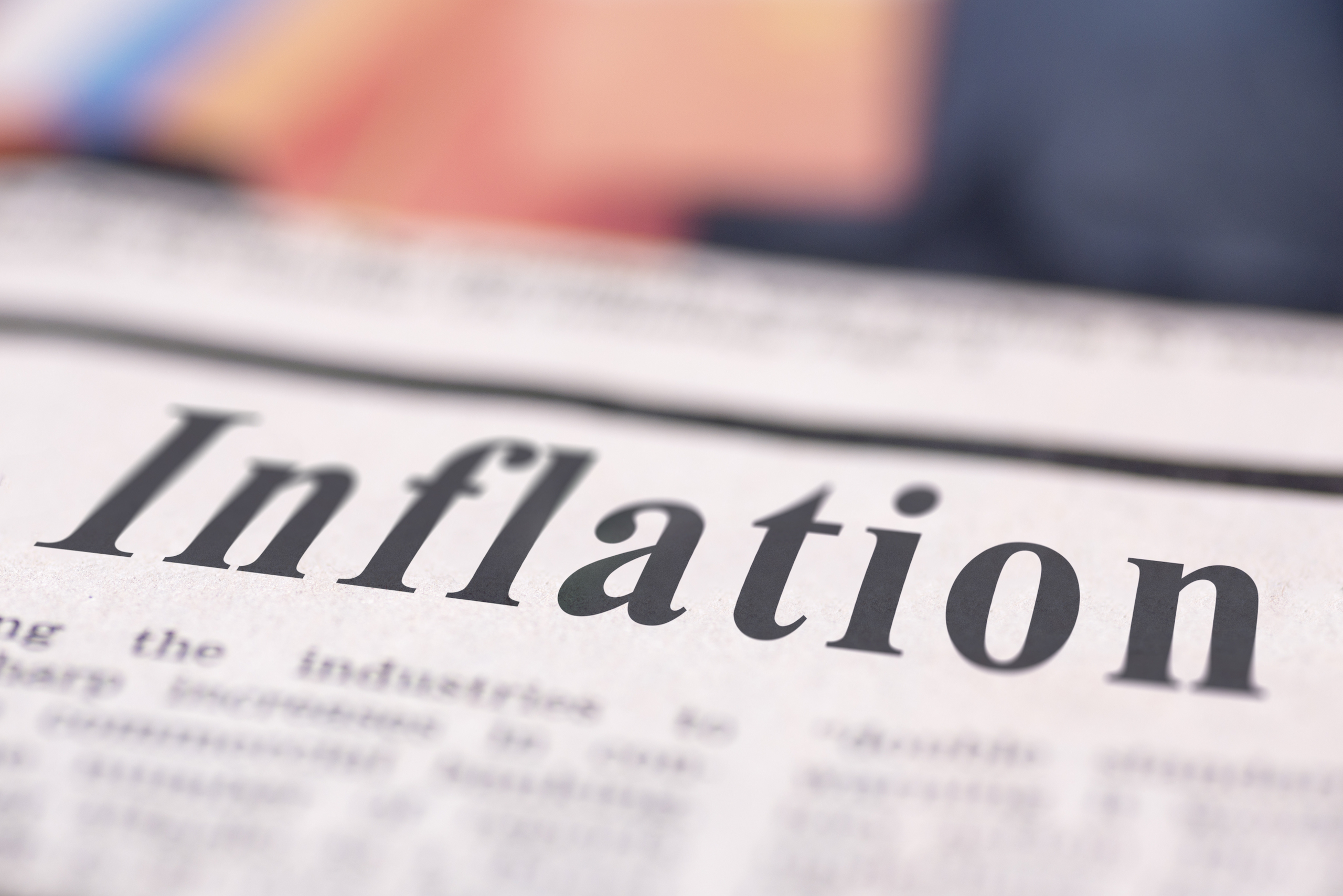 Inflation written newspaper close up