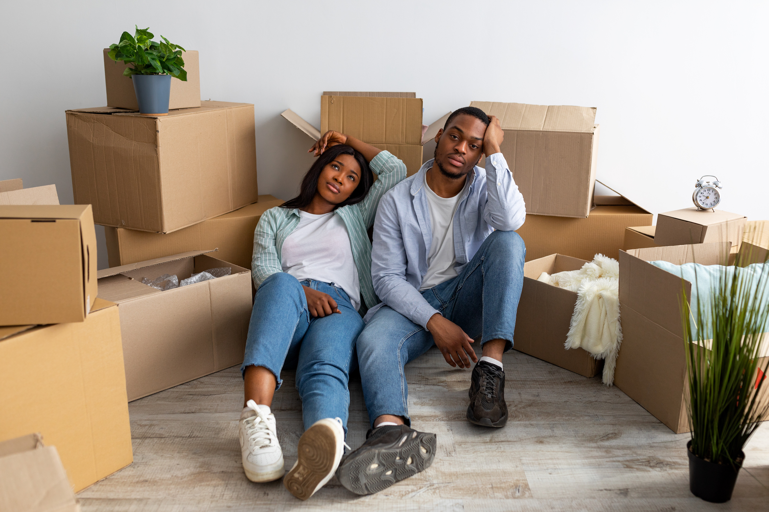 Couple exhausted after moving to new apartment
