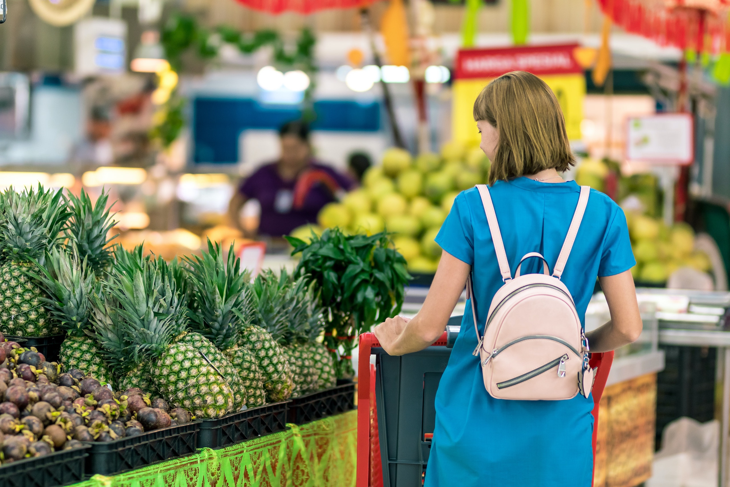 woman shopping in produce area