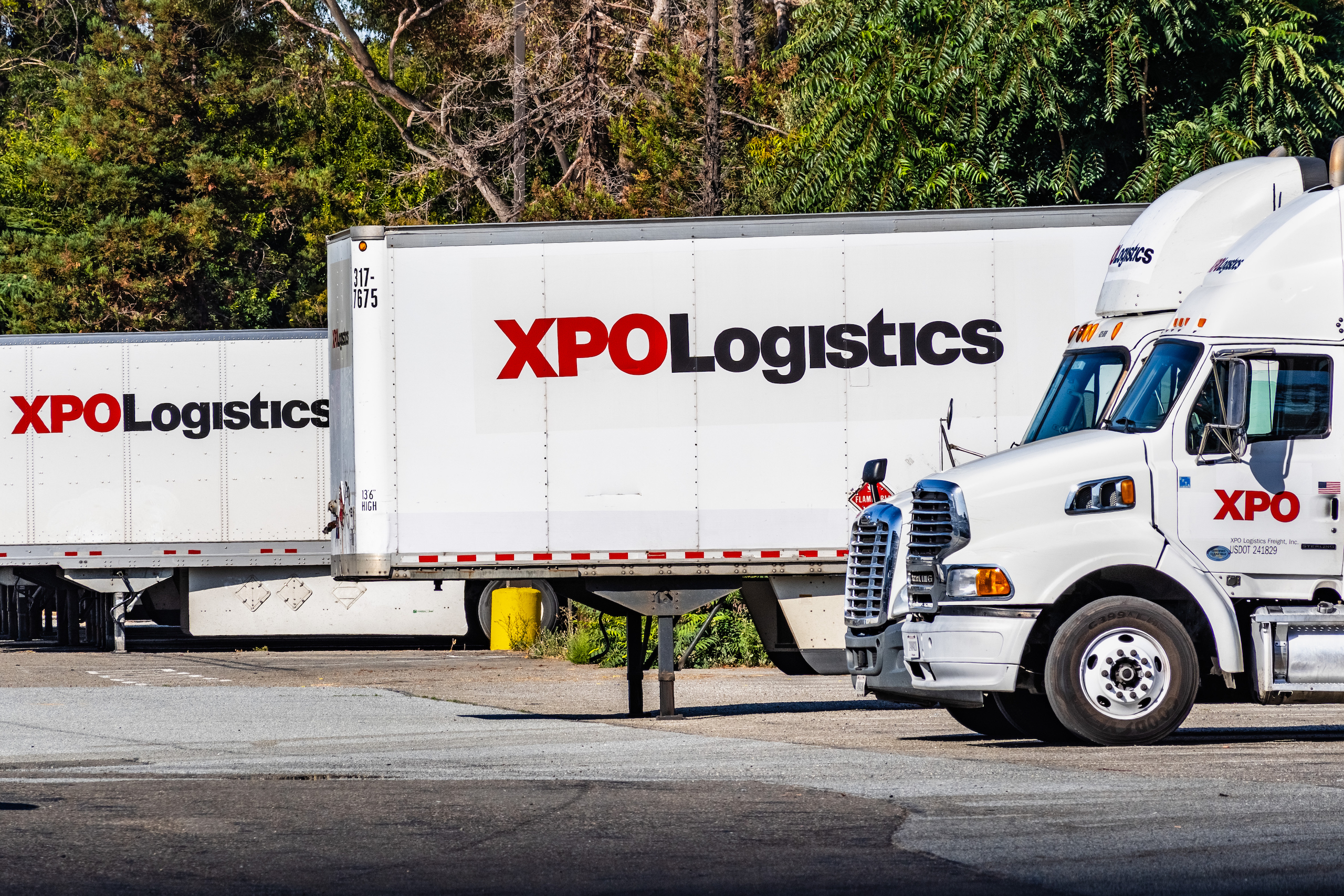 July 31, 2019 San Jose / CA / USA - XPO Logistics distribution point in San Francisco bay; XPO Logistics, Inc. is one of the 10 largest providers of transportation and logistics services in the world