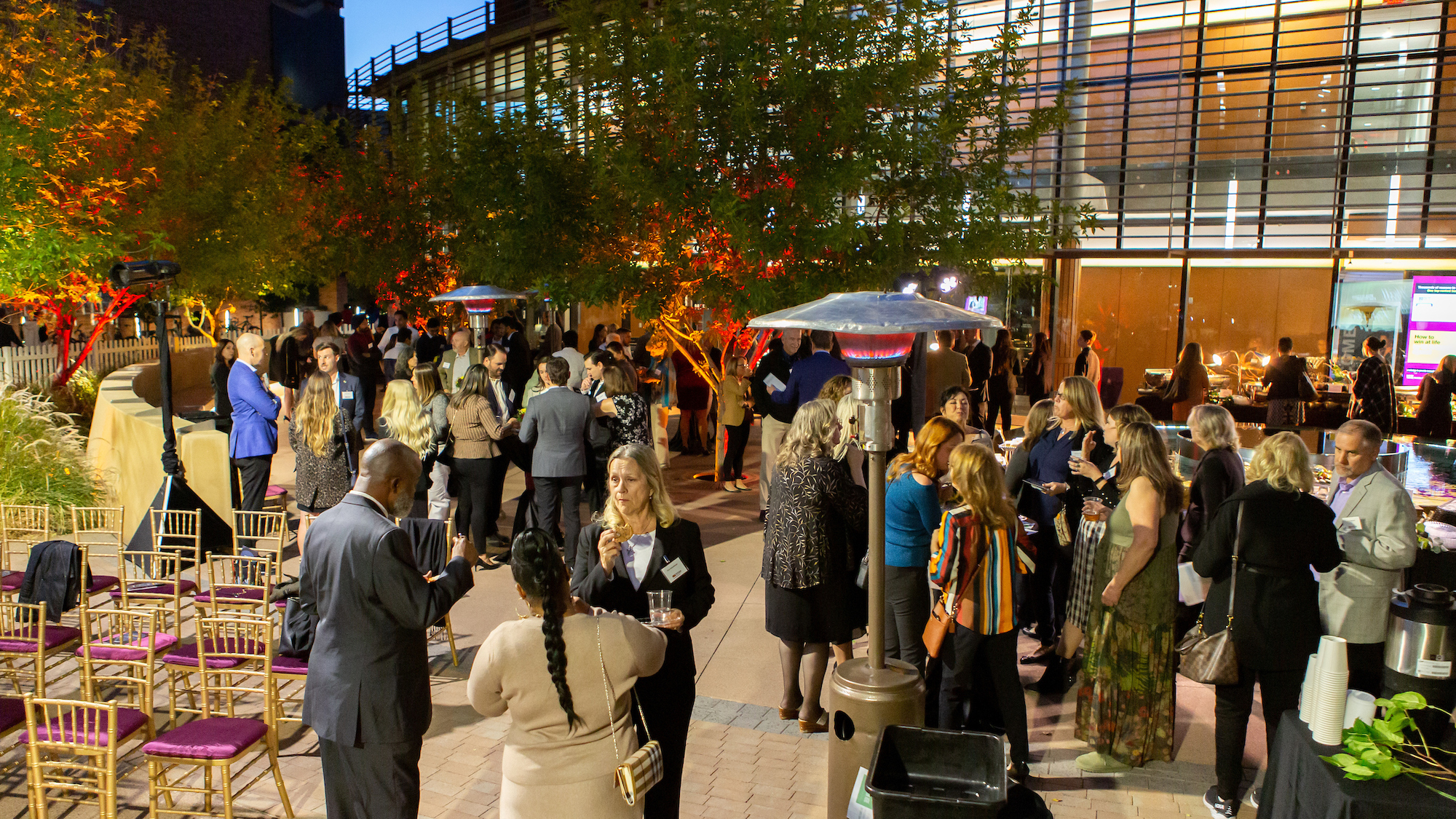 Attendees on the patio at the W. P, Carey Alumni Hall of Fame event.