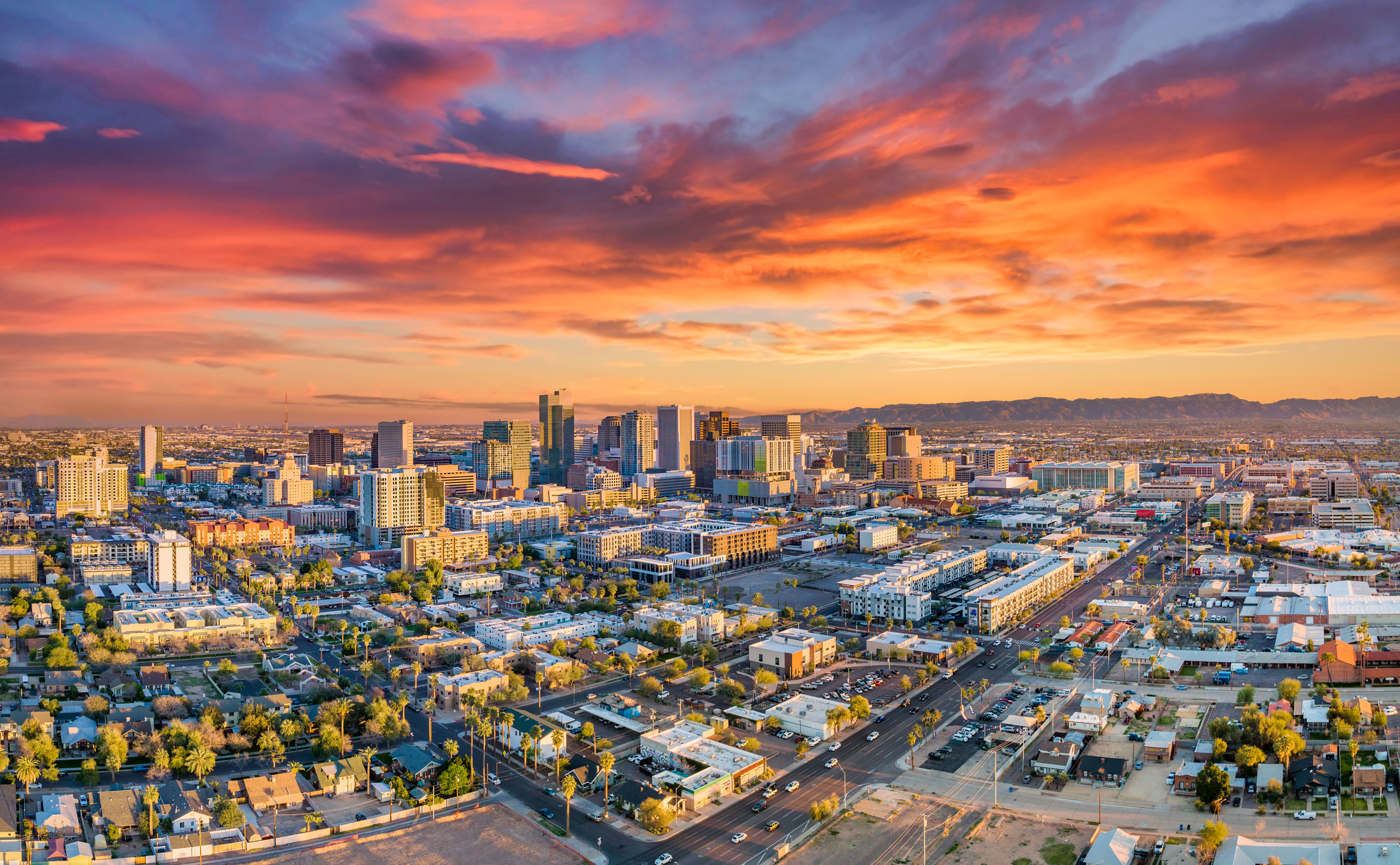 A sunset scene above buildings in Phoenix.