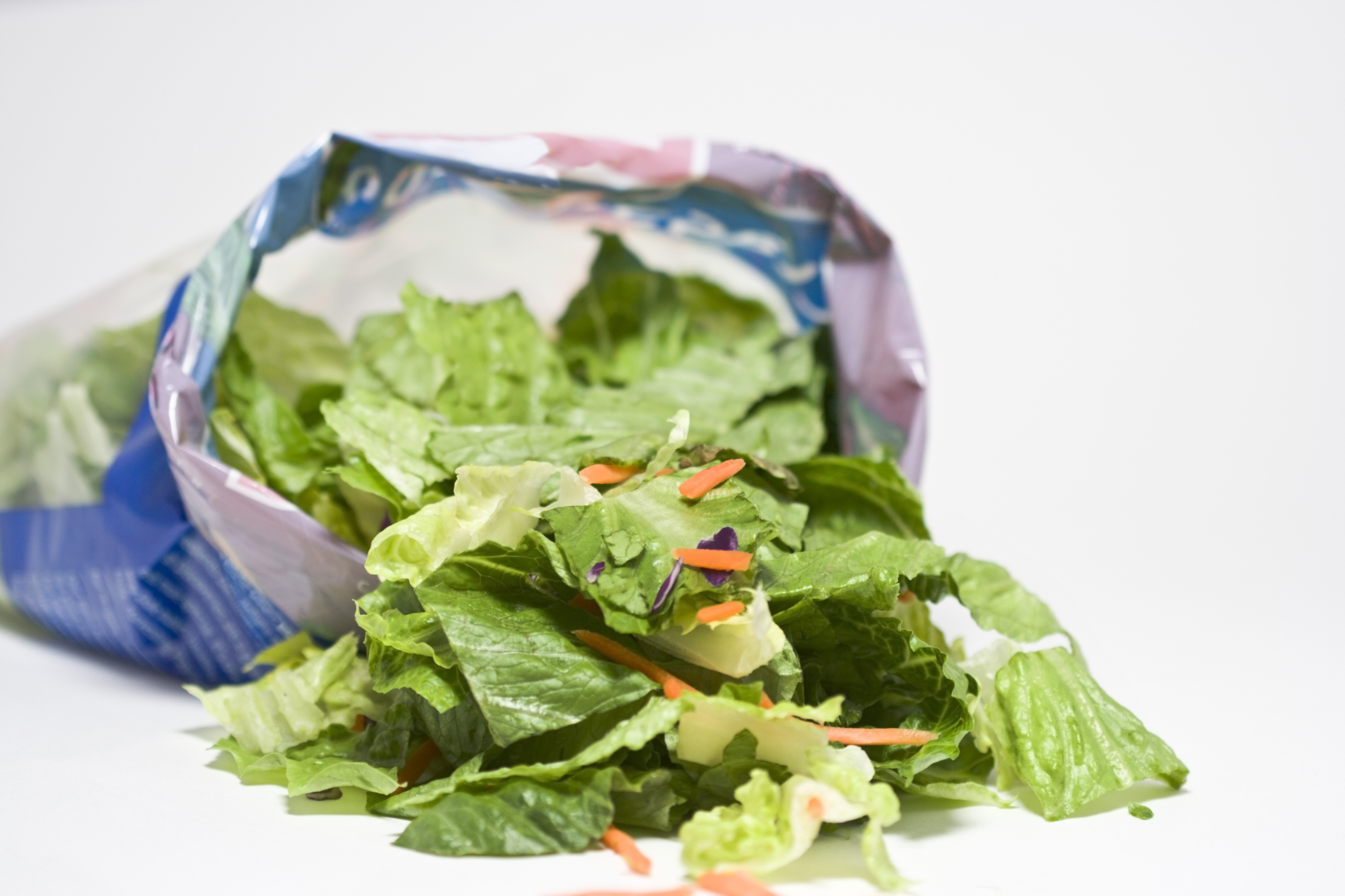 An open bag of salad.
