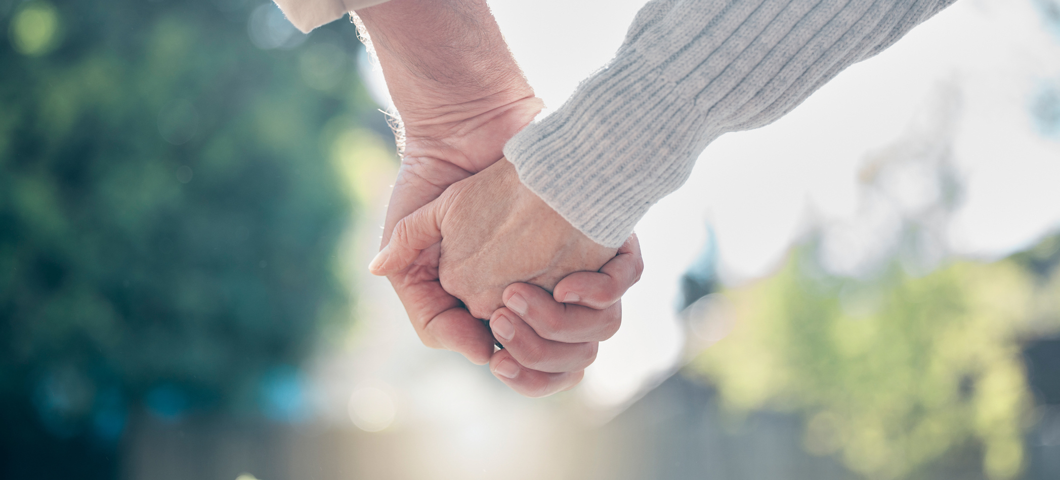 Couple holding hands