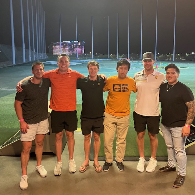 MS-FIN alumnus Will Tawney at TopGolf with others