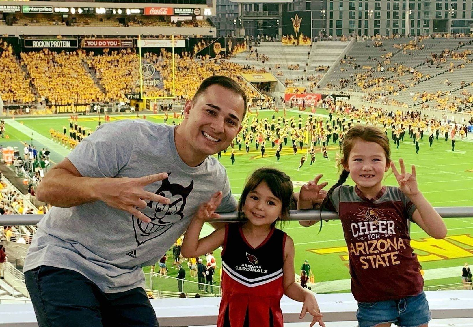 Michael Hoffman (BS Marketing ’06) and his daughters (from left) Violet and Scarlett