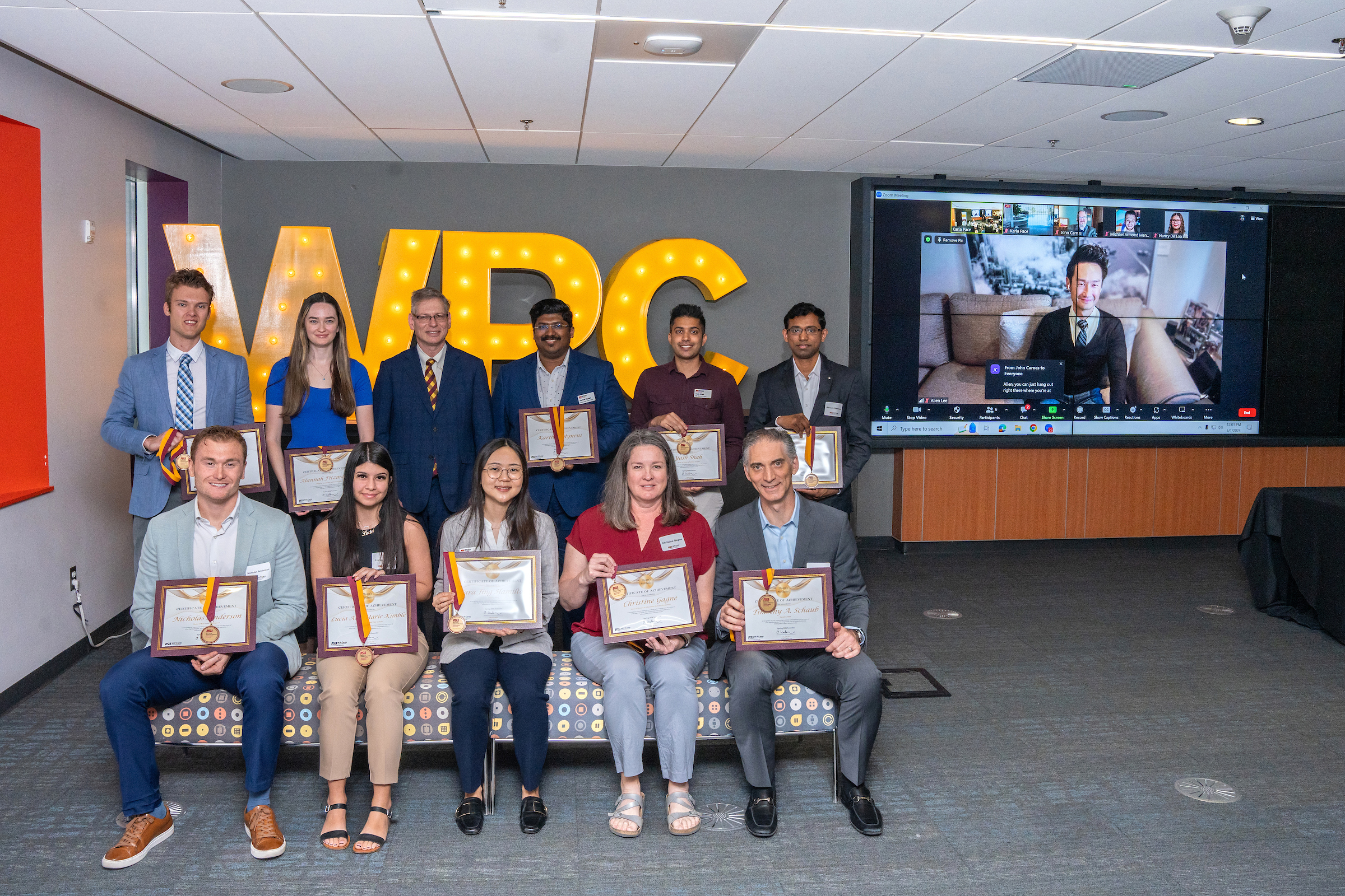 Graduate Dean's Medalists pose with Dean Kadan