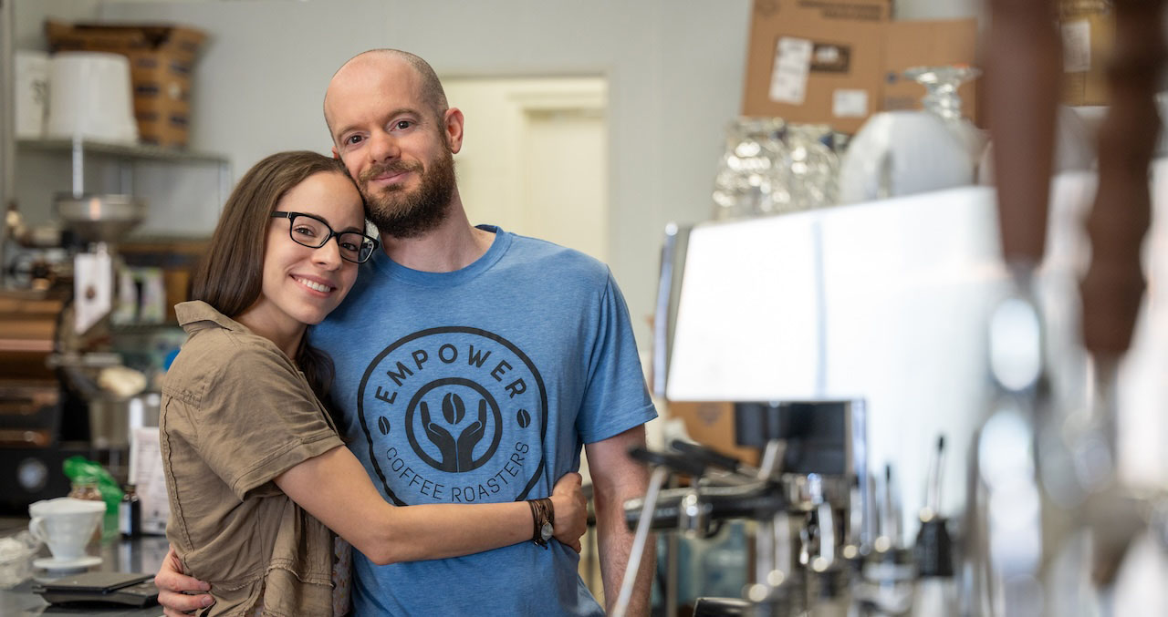 MBA alumna Denise Napolitano hugging her husband Zach Gamza