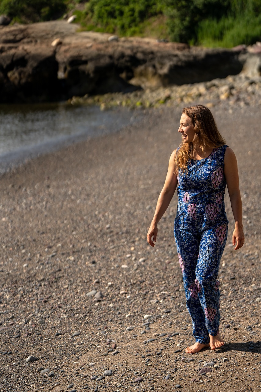 MBA alumna Heather Shipp walking on a beach