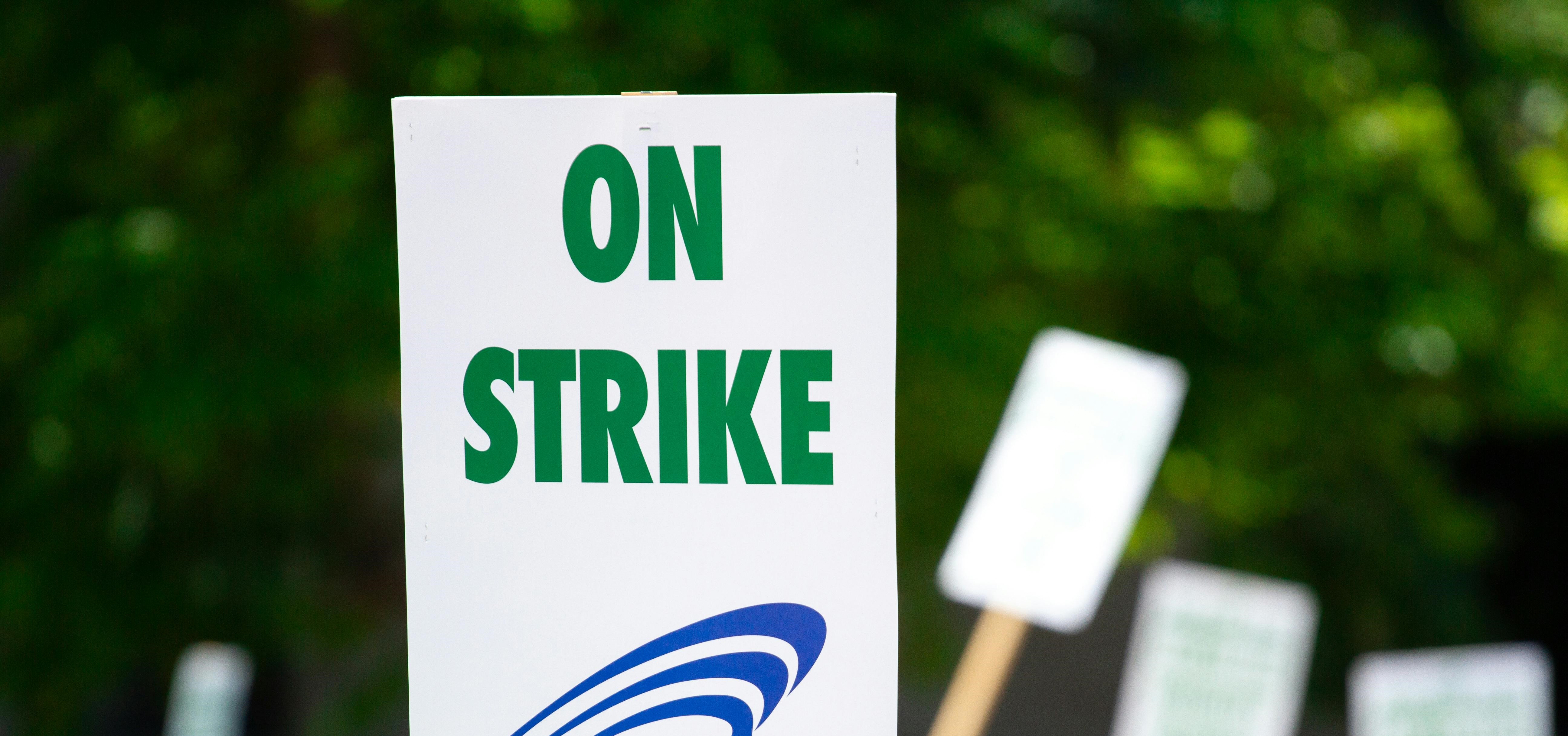 An "On strike" sign.