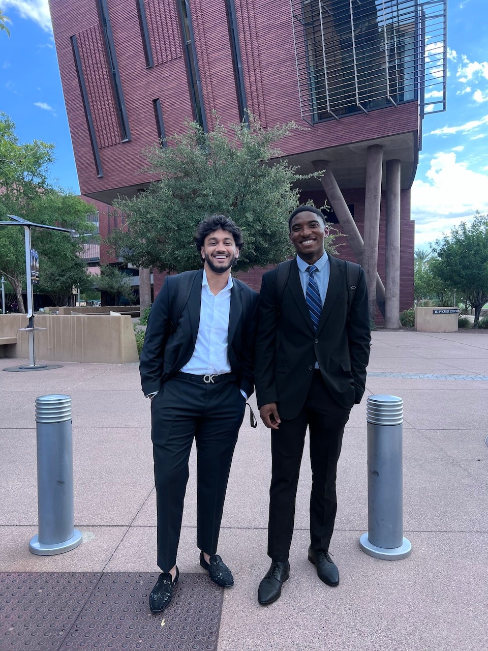 MS-AIB student Isaac-John Onwuamaegbu with a fellow student on campus for his first day