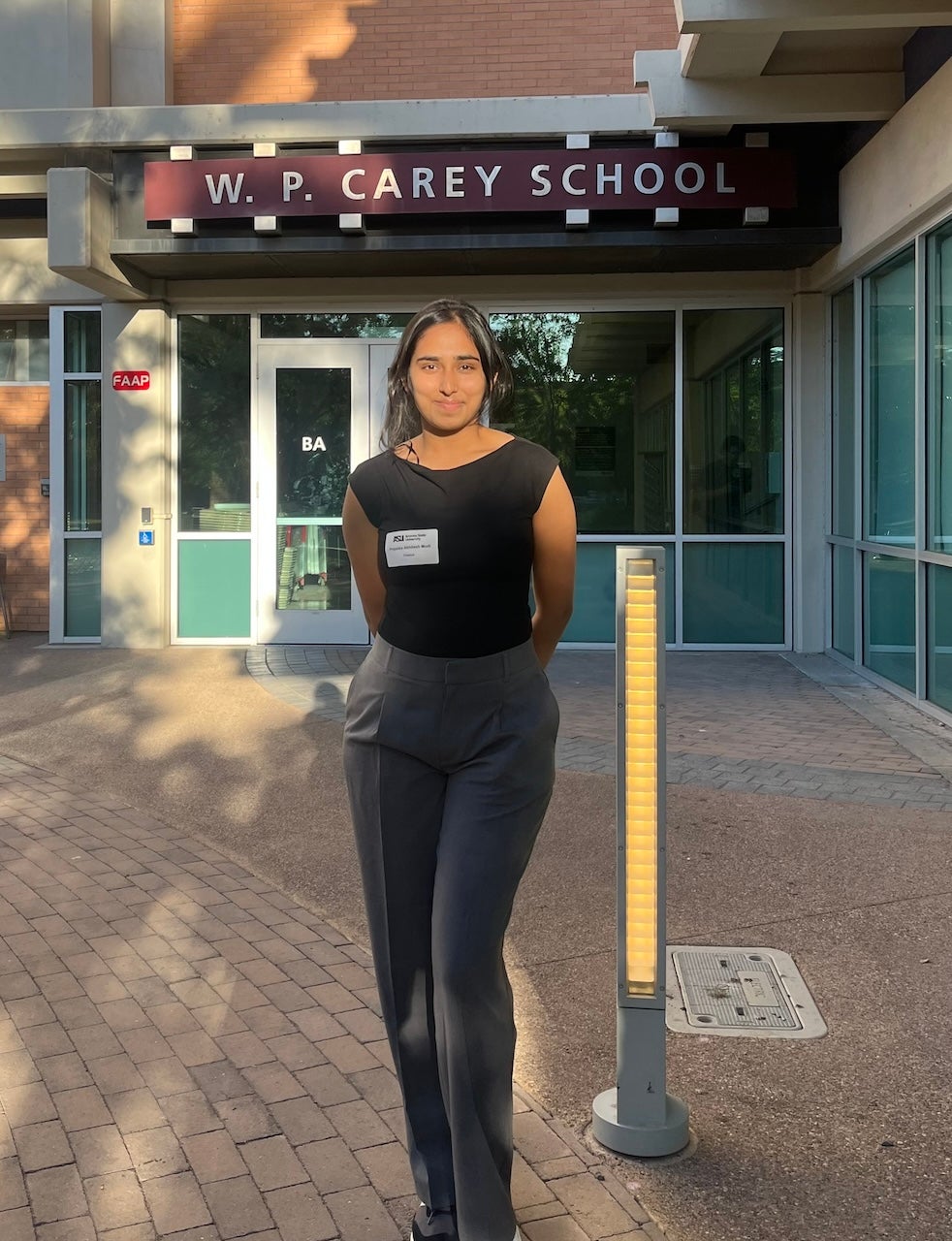 MS-FIN student Priyanka Modi in front of a building at the W. P. Carey School of Business