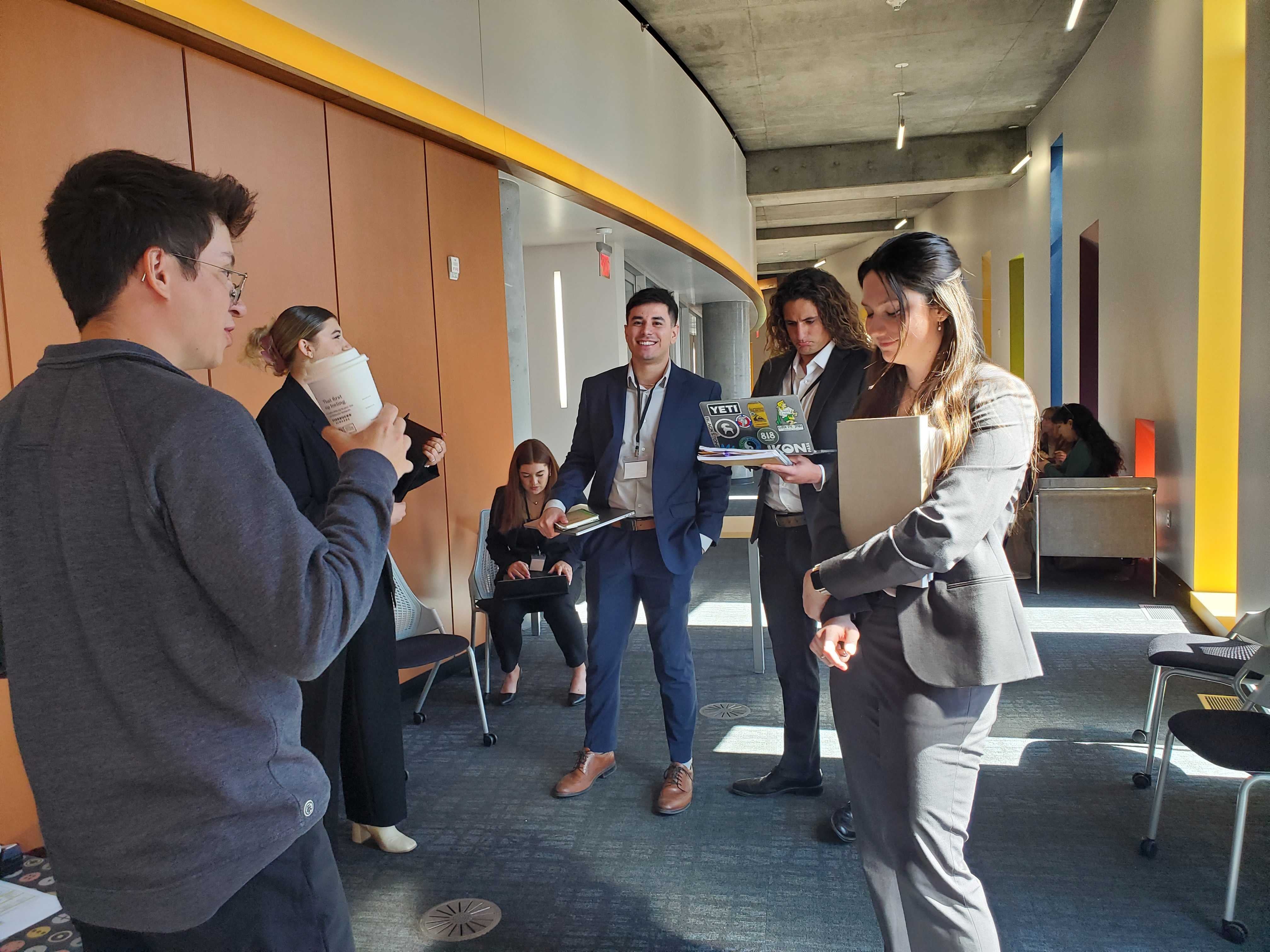 Students prepare for the sales role-play competition.