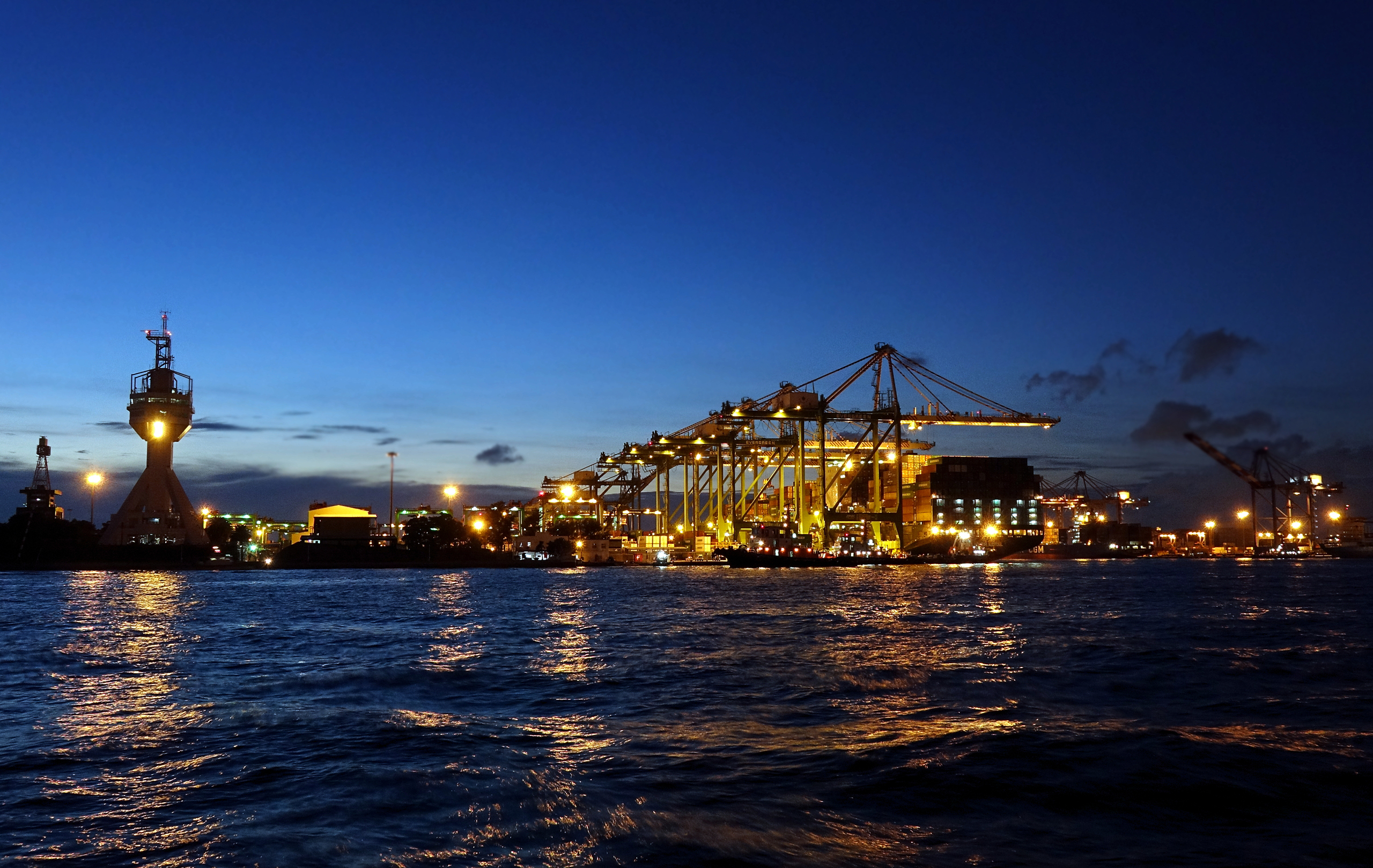 kaohsiung_taiwan_-_june_2_2019-_a_view_of_the_busy_kaohsiung_container_shipment_port_at_evening_time.jpg