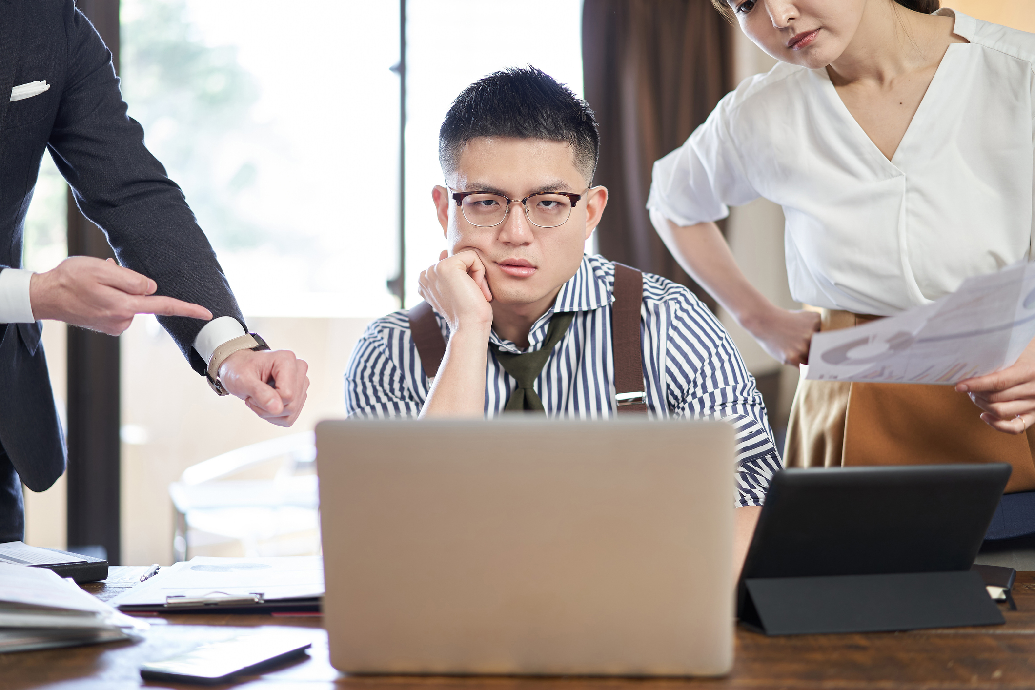 Unhappy man with laptop
