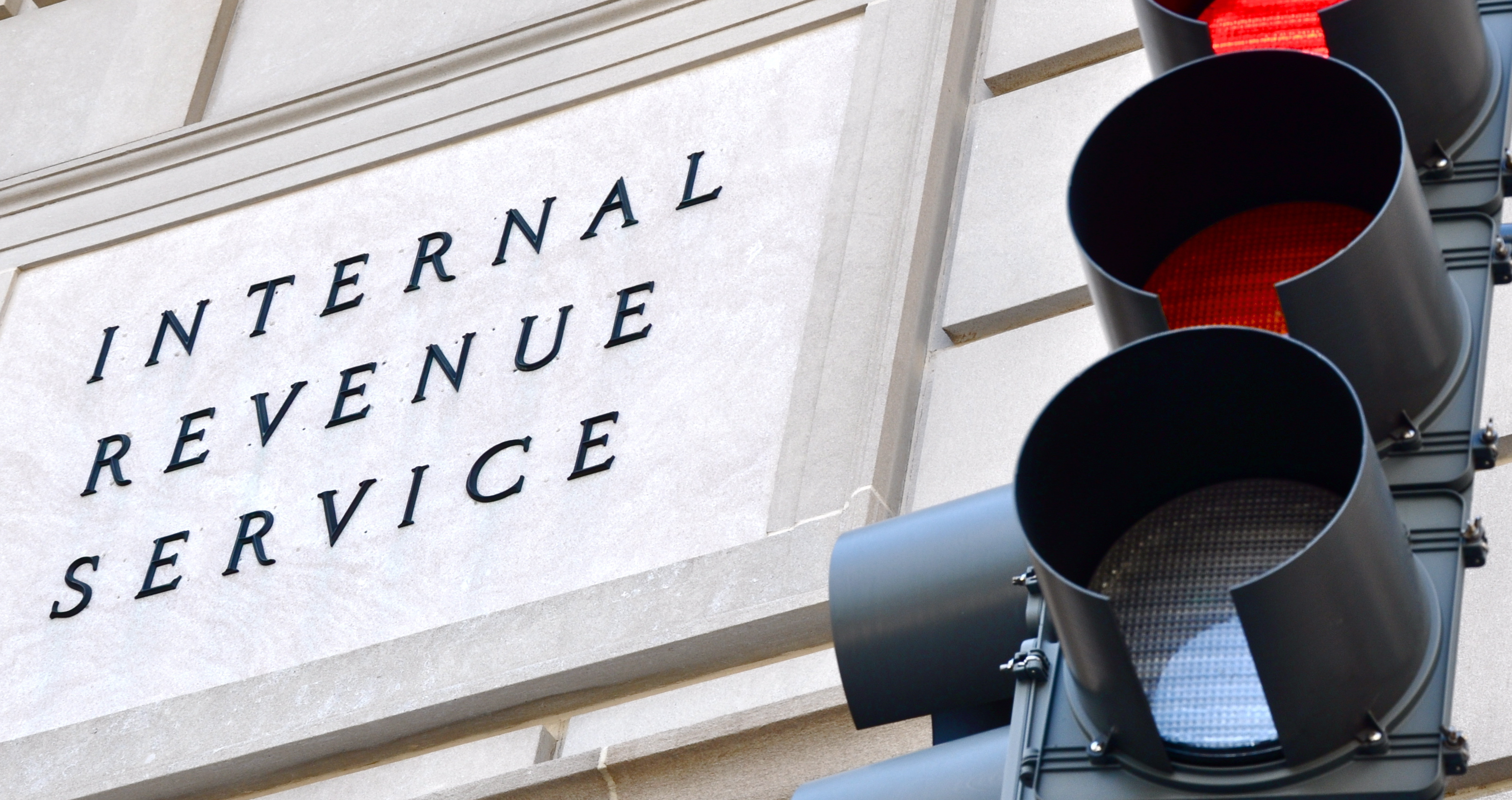 IRS sign and red stoplight