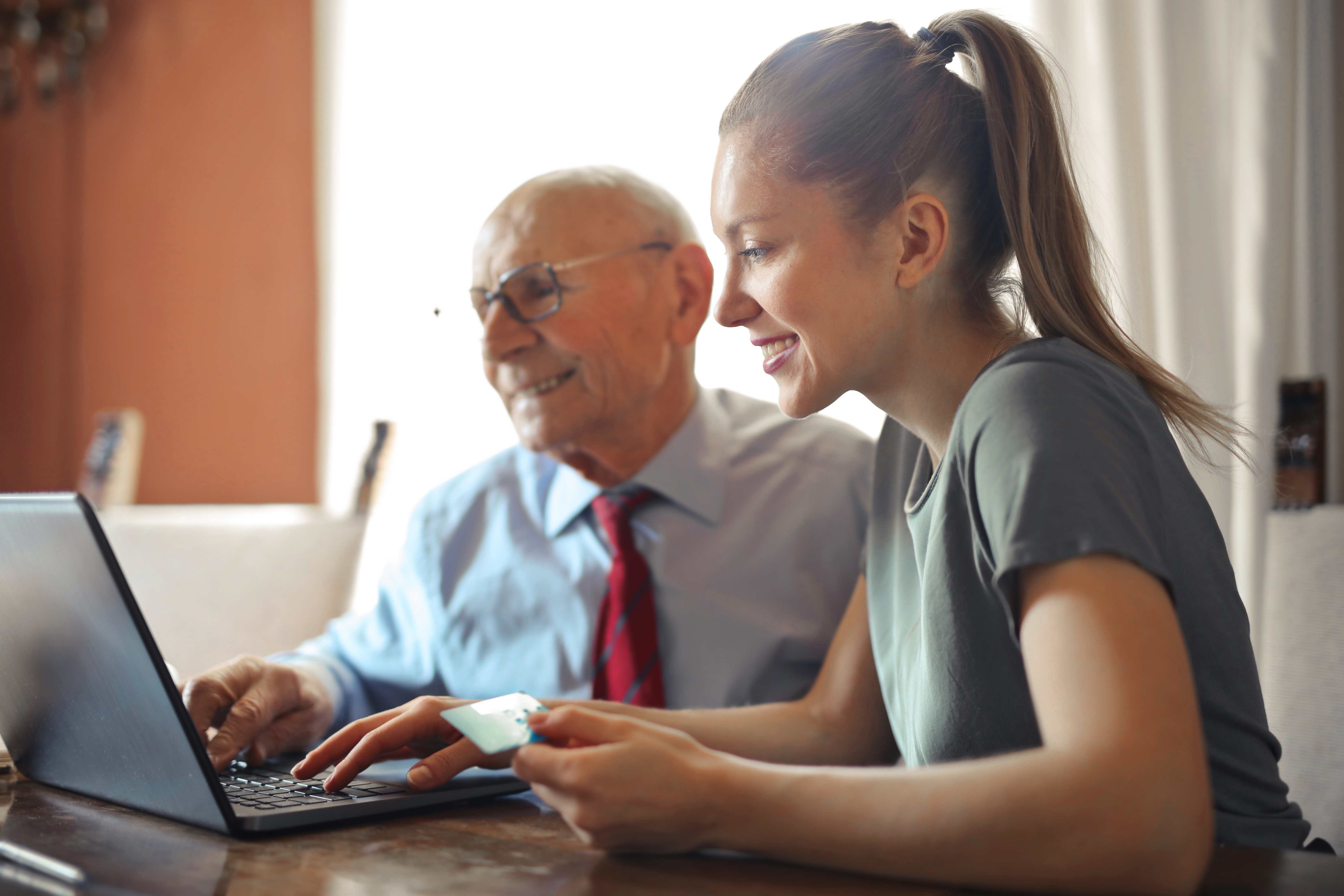 Man and woman looking at computer