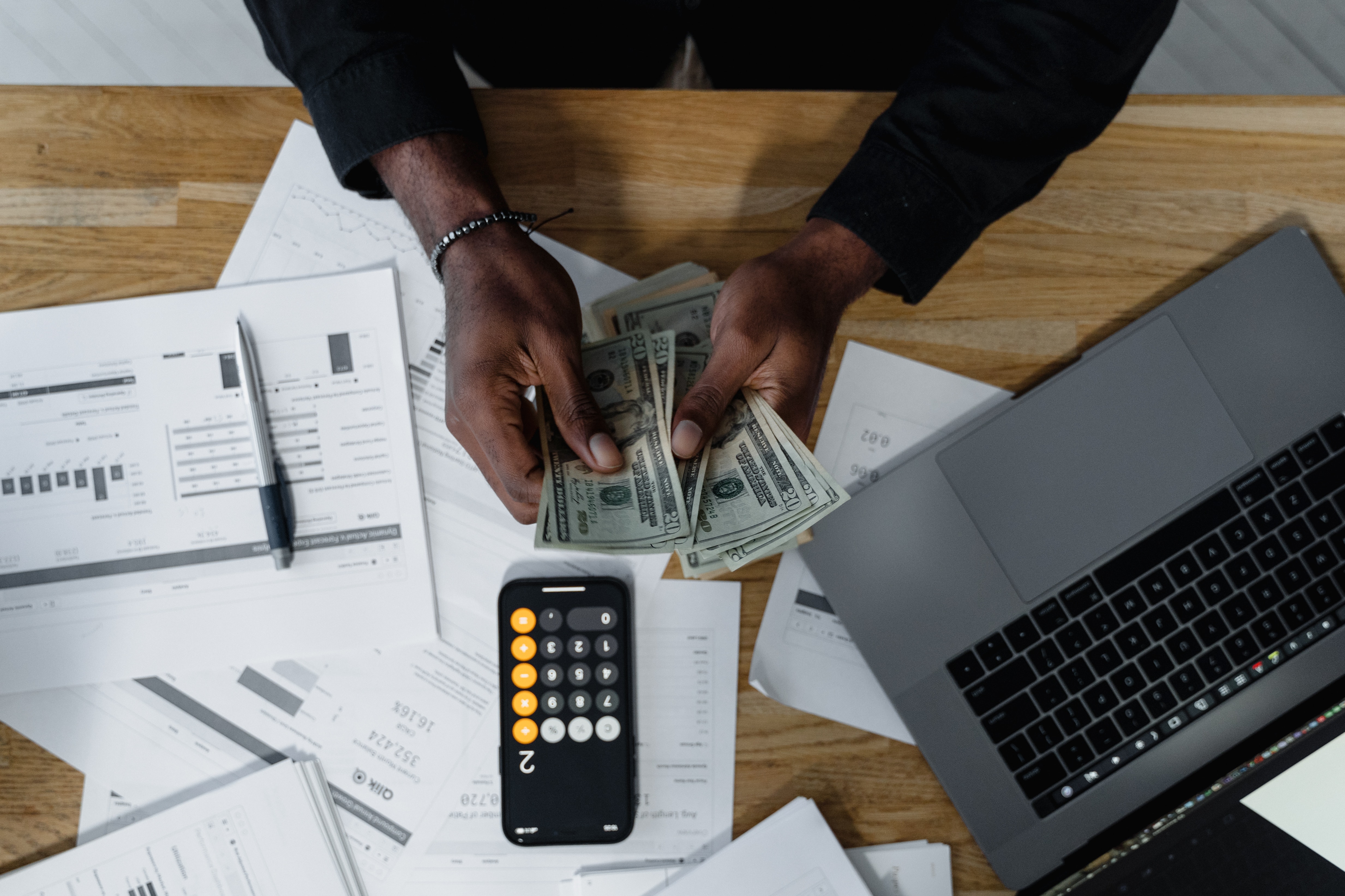 Person calculating bills.