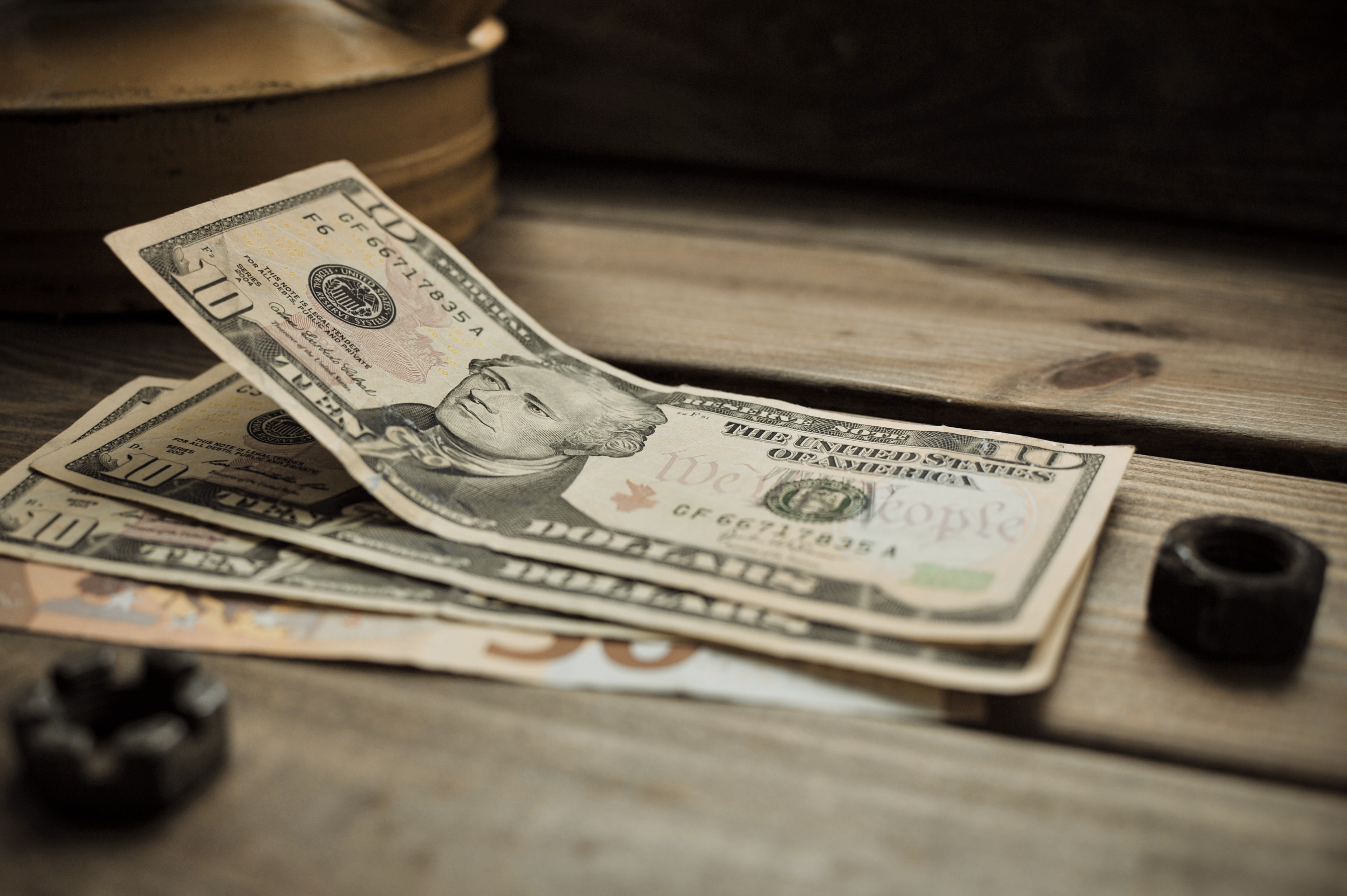 Stack of several $10 bills.