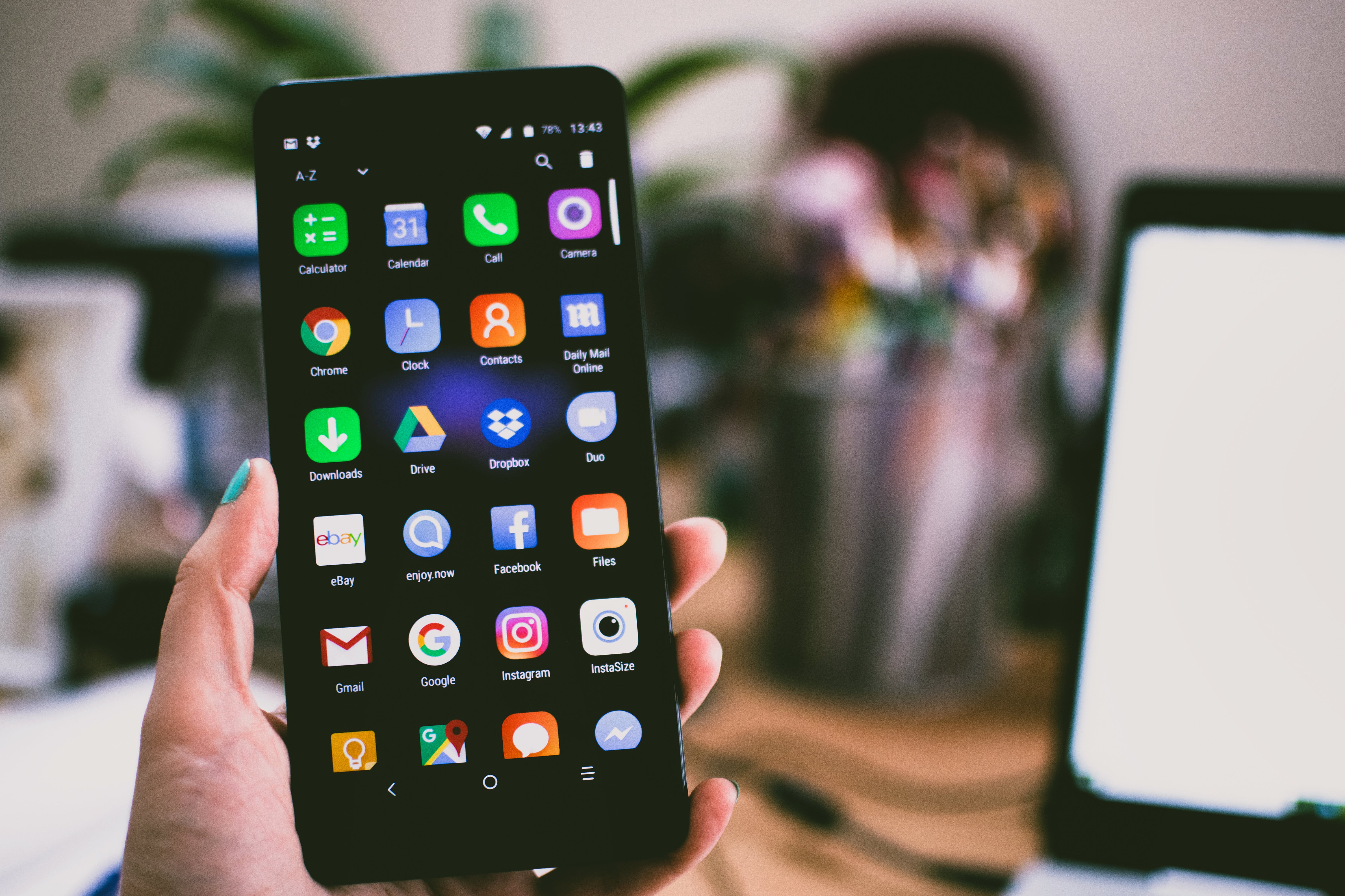 Person holding a smart phone.