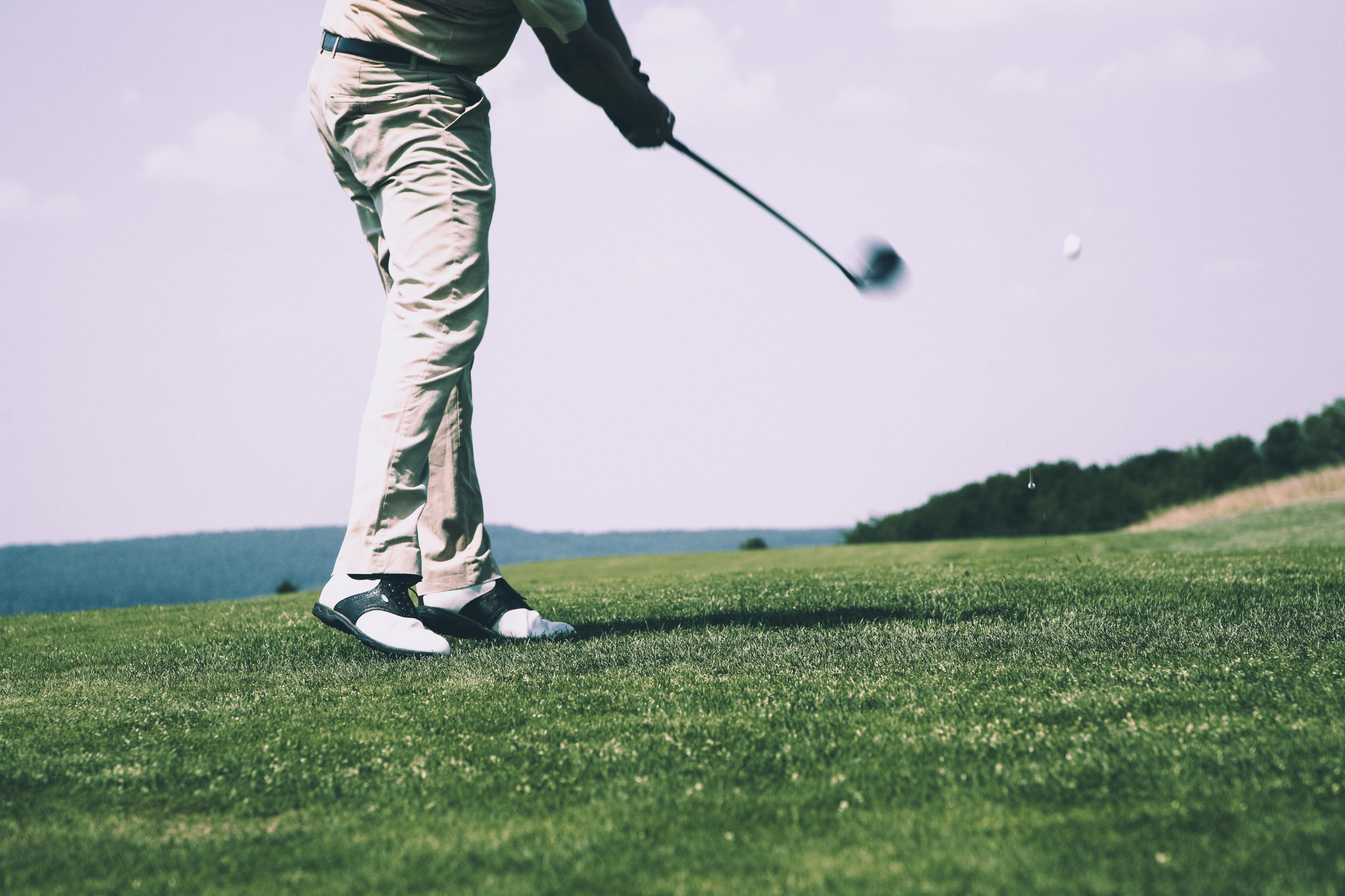 Man playing golf.