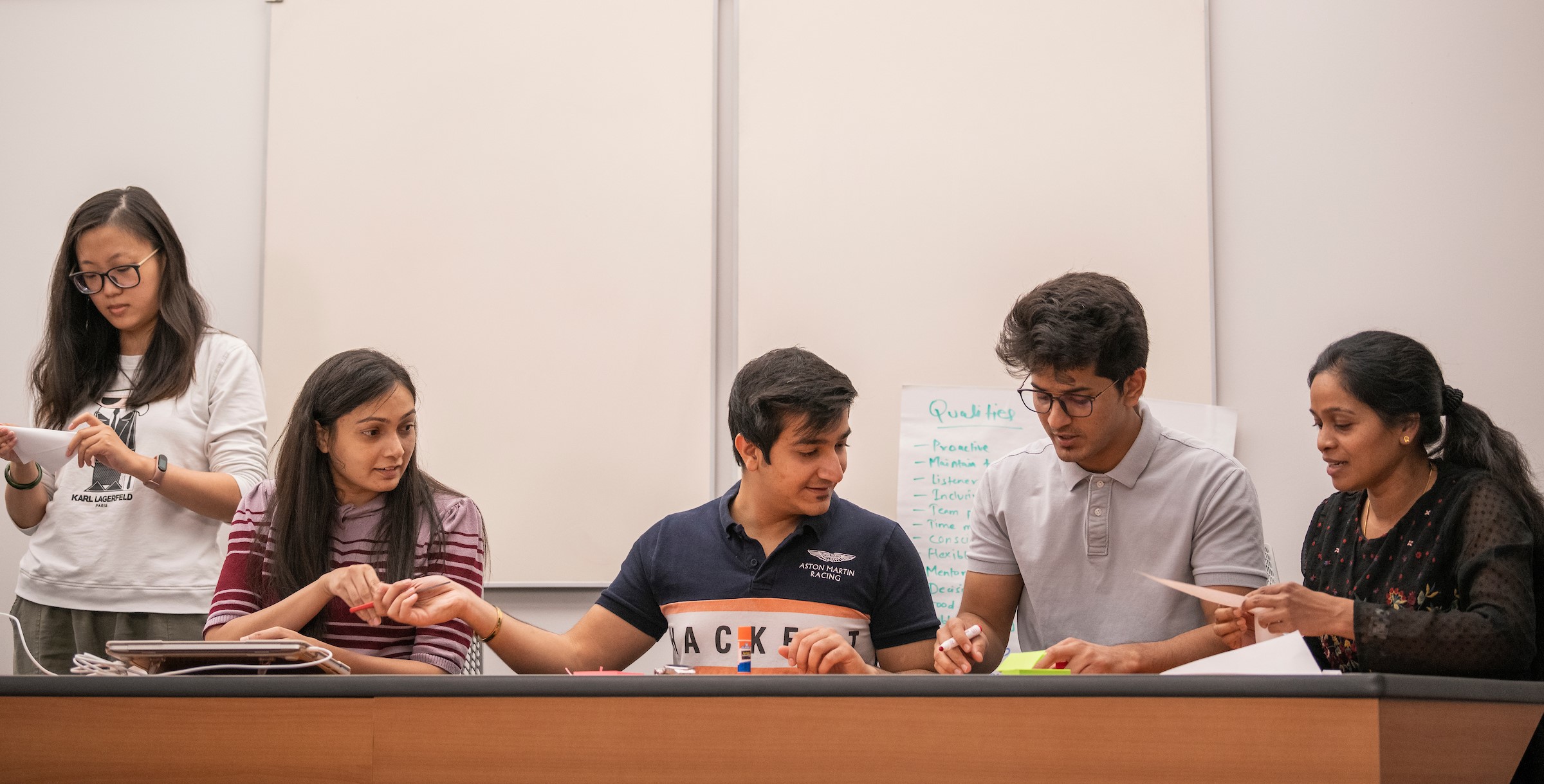 MS-ISM students working on a project.