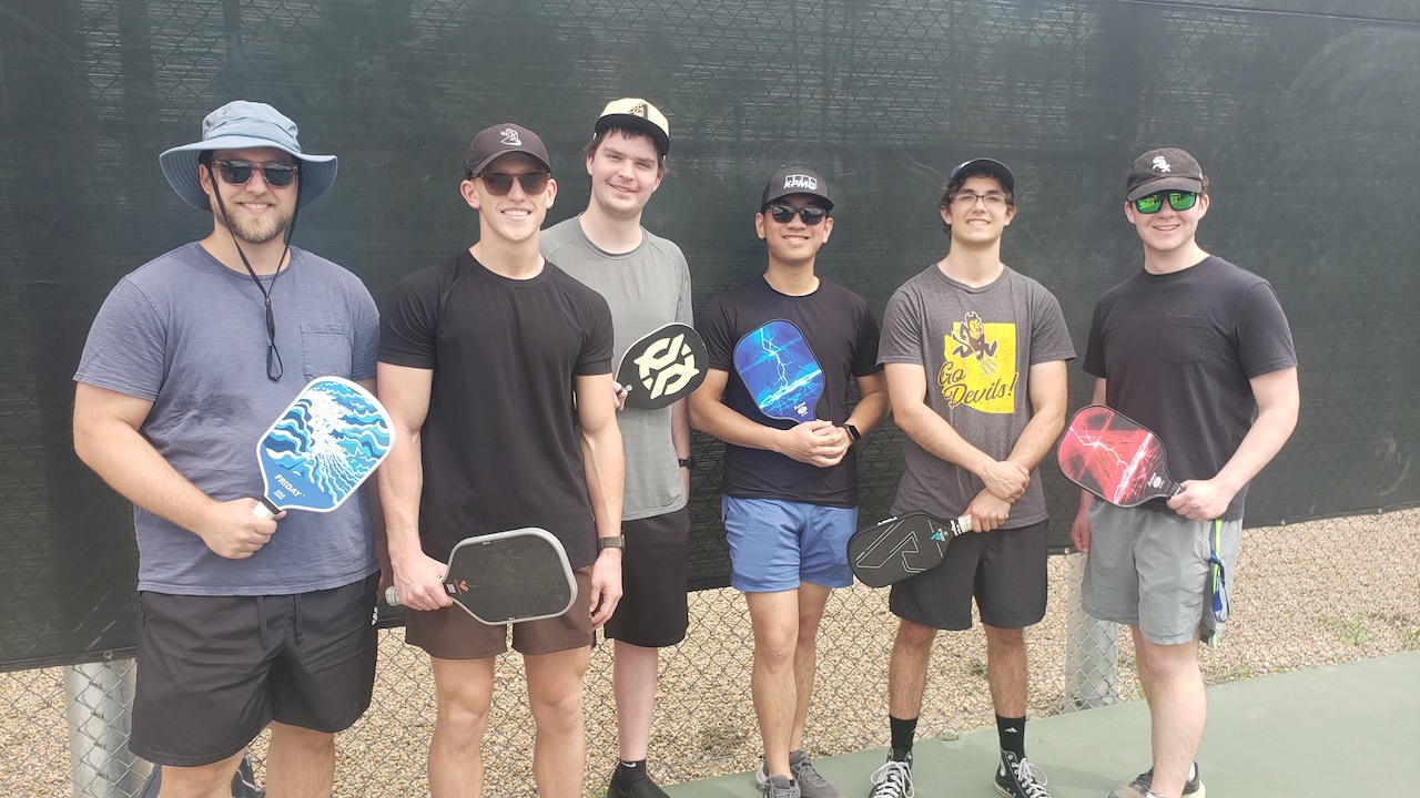 Nick Brockelman with fellow MACC students while playing pickleball