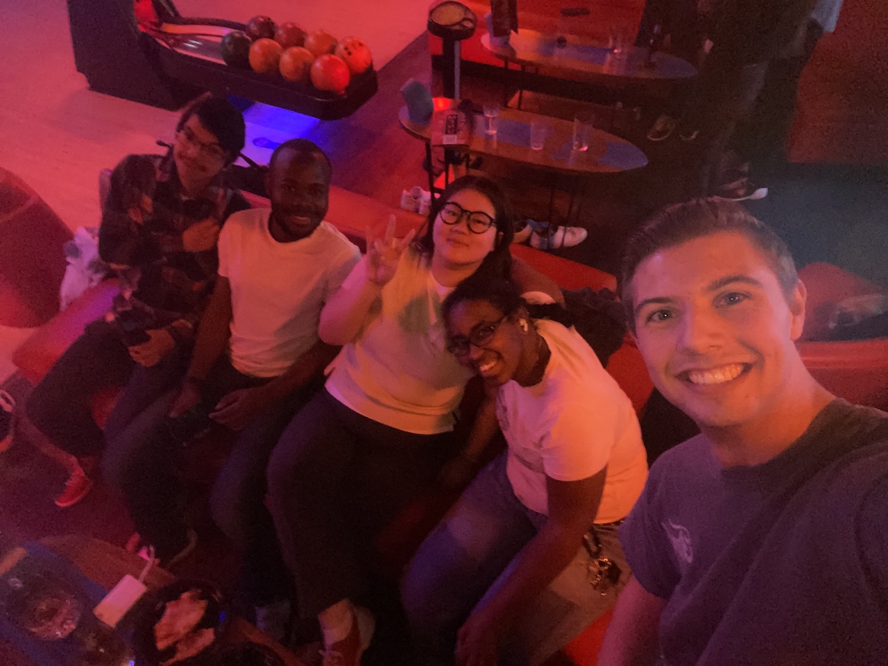 MS-AIB student Melisa Hasan with classmates at a bowling alley