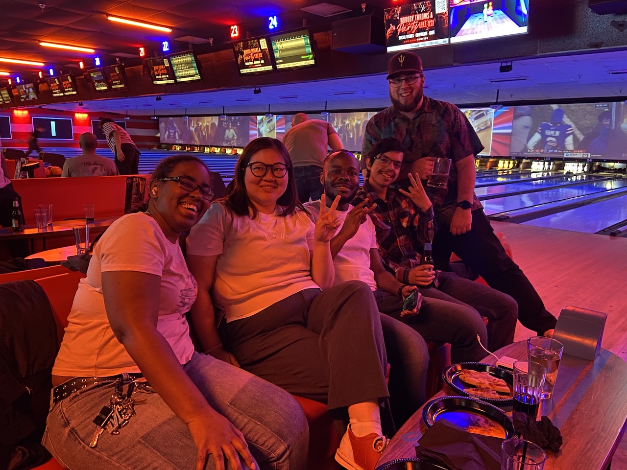 MS-AIB student Melisa Hasan with classmates at a bowling alley