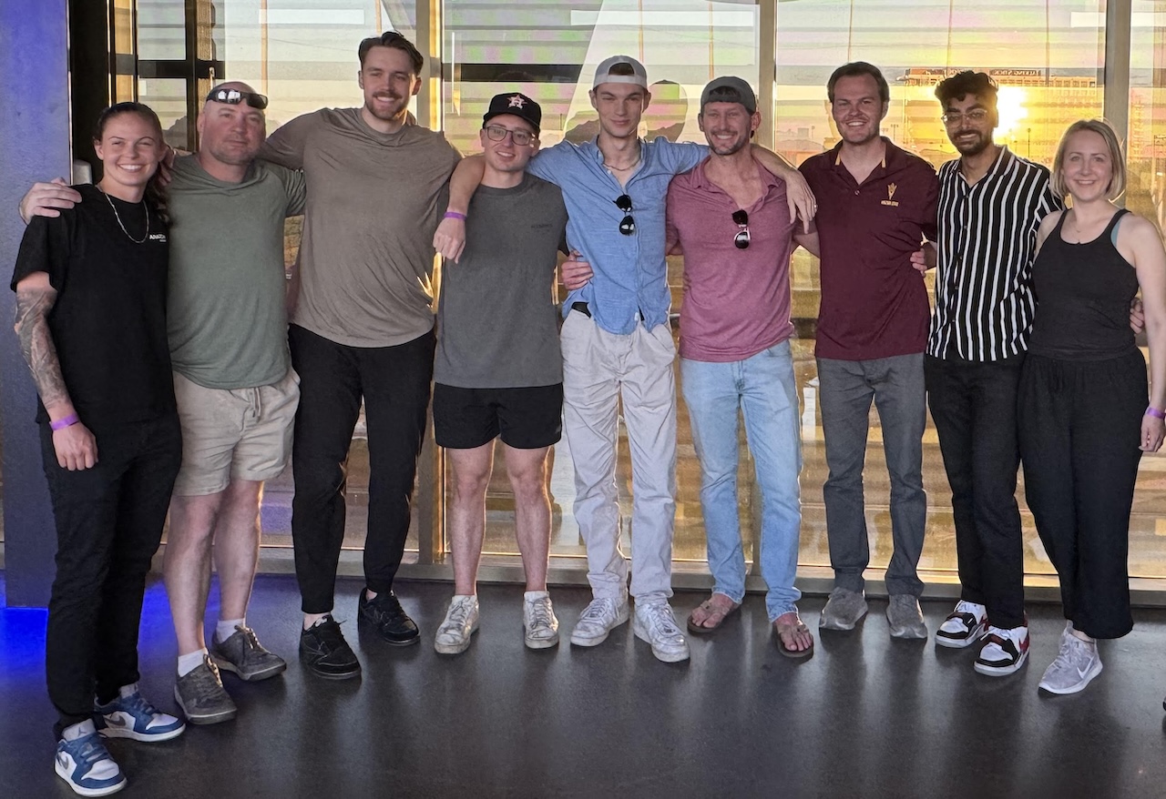 MS-FIN graduate Samuel Bowker with some of his classmates at TopGolf