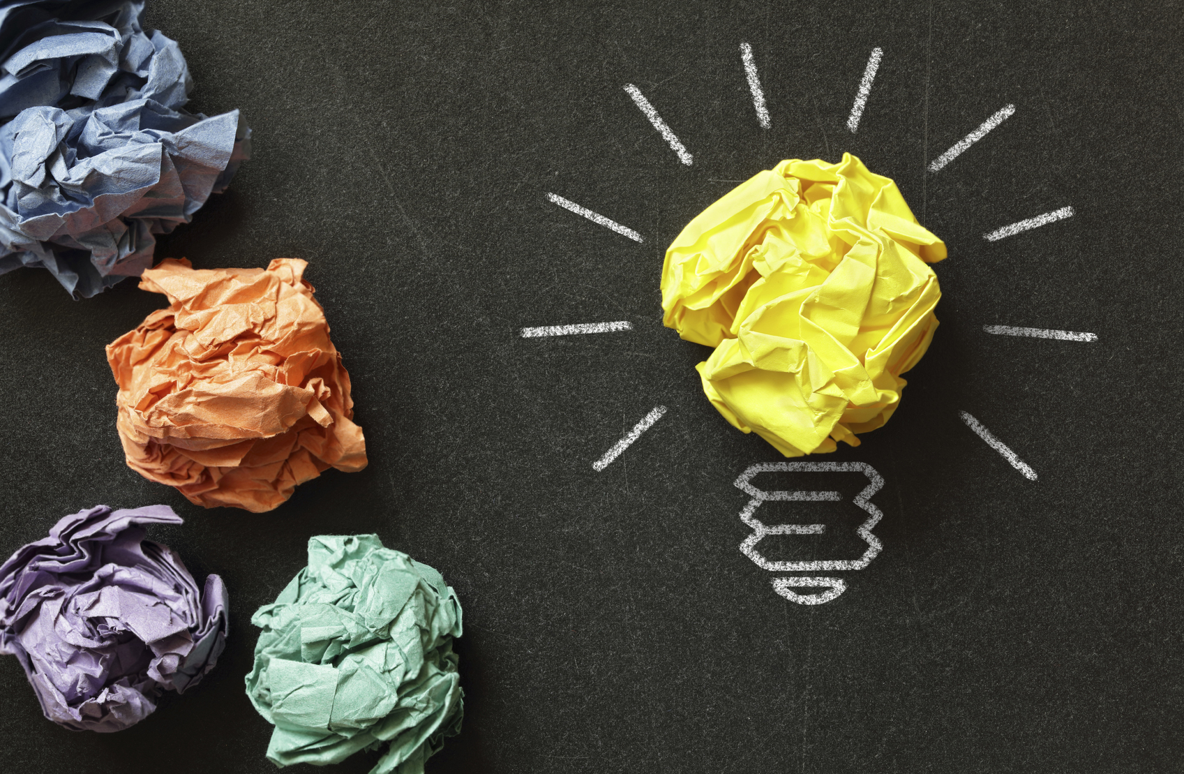 Crumpled paper in blackboard lightbulb art Crumpled paper in blackboard lightbulb art