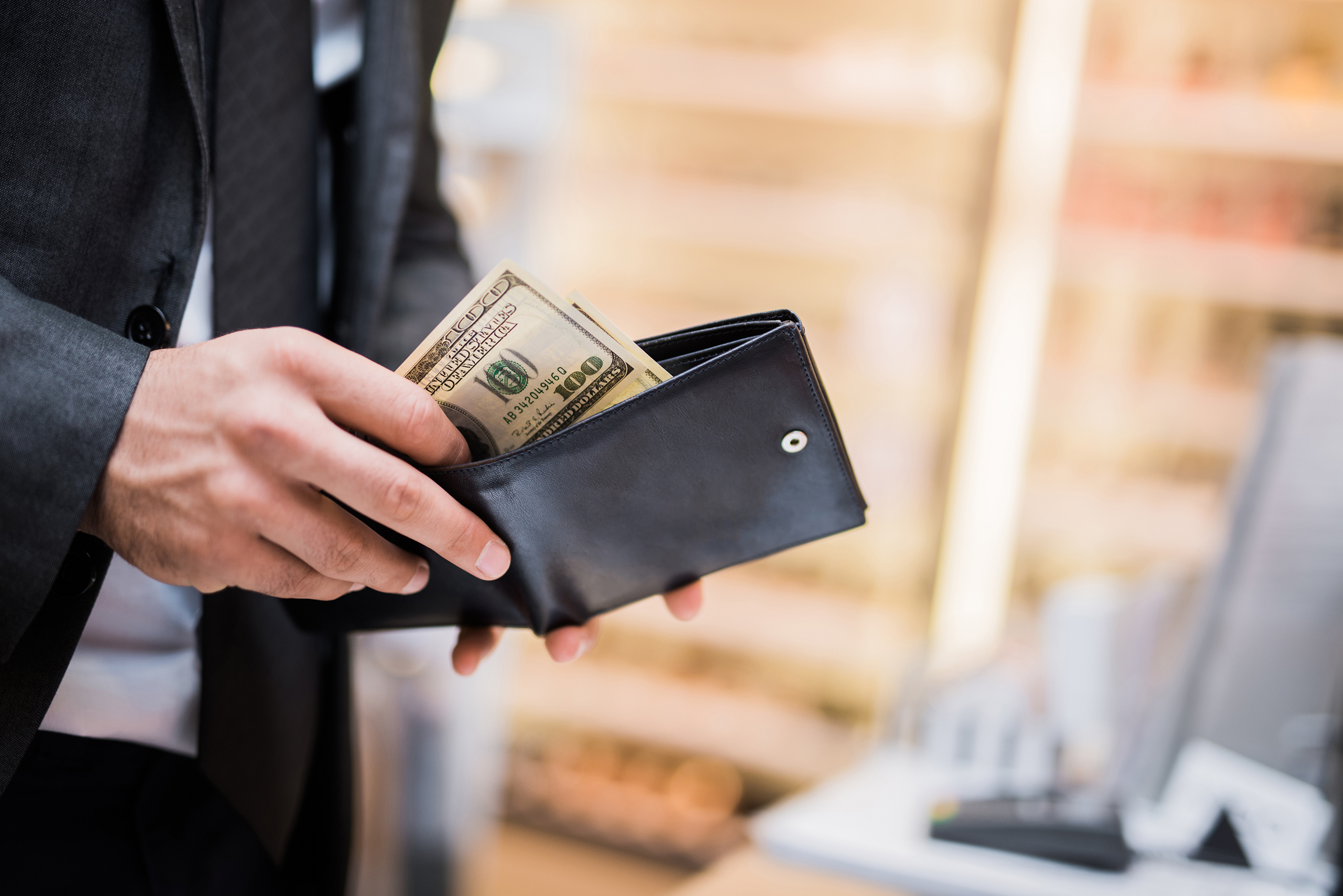 Man with Money in Wallet.jpg Man with Money in Wallet.jpg